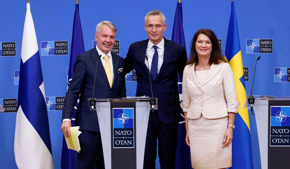 Ann Linde and Pekka Haavisto with Jens Stoltenberg